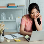 A young woman participating in an online focus group with Respondent