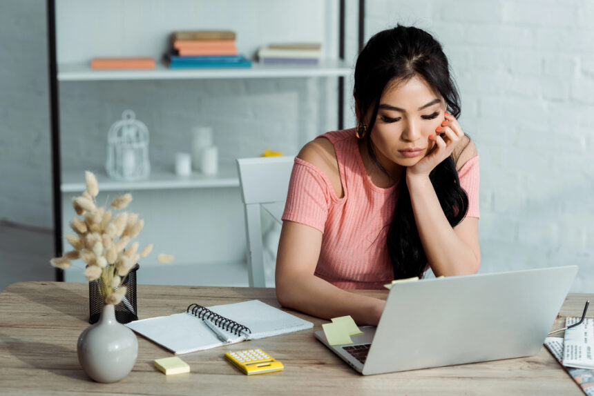 A young woman participating in an online focus group with Respondent