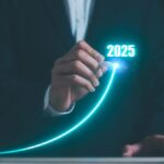 Businessman using pen drawing line for increasing arrow from 2024 to 2025