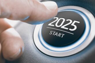 Finger pressing a car ignition button with the text 2025 start.