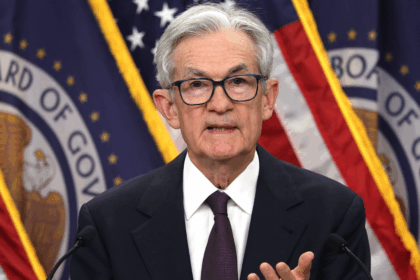 Fed Holds Interest Rates Steady, Resisting Pressure From Trump