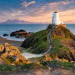 Tŵr Mawr lighthouse (meaning "great tower" in Welsh), on Ynys Llanddwyn on Anglesey, Wales, marks the western entrance to the Menai Strait.